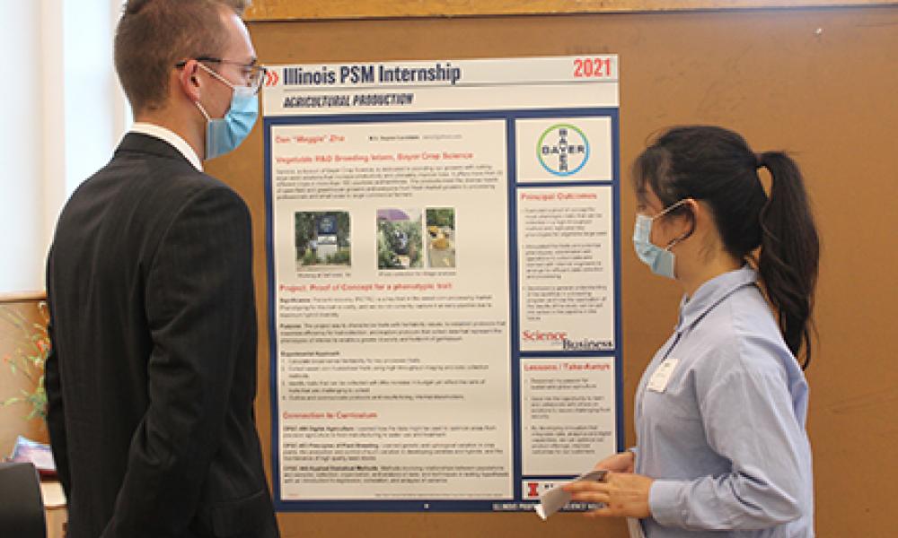 Szymon and Maggie discuss internships at 2021 IL PSM Poster Showcase